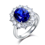 5.26 Carat Lab Grown Royal Blue Sapphire  18K Gold Radiance Ring