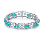 27.56 Carat Aqua Mosaic Chain・Oval Neon Blue Lab Paraiba 18K Gold Geometric Hollow Diamond Bracelet