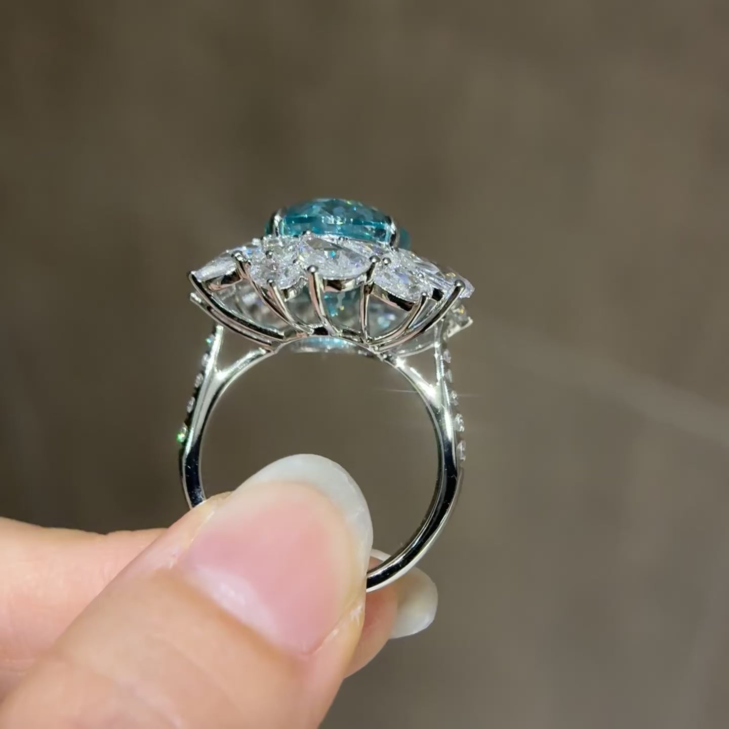 12.71 Carat Lab Neon Blue Paraiba 18K Gold Graduated Pear Ring